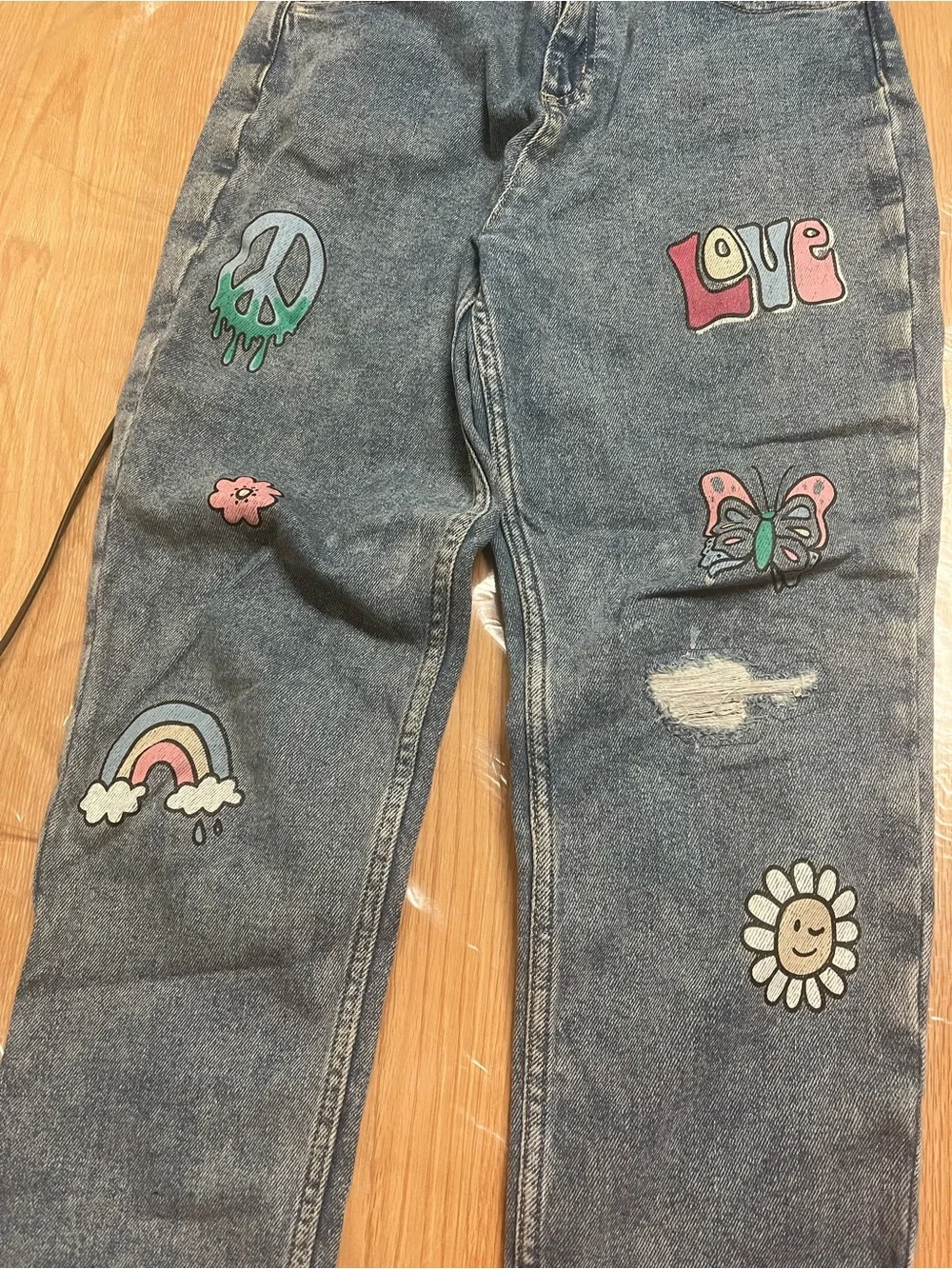 Justice Blue Denim Straight-Leg Jeans with Colorful Patch Art